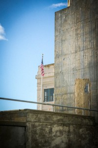 Alcatraz Flag Flag in front of the administration building of Alcatraz penitentiary, off the coast of San Francisco, USA