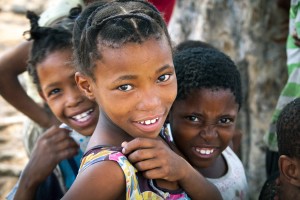 Cheeky Kids he head of village communities in this region of Namibia has the title of Queen. If this village has a Princess, it is this girl. Not really camera shy. A lot of fun to photograph.