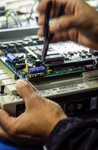 Circuit Testing Inspecting an electronic circuit board on an test bench