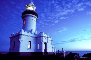 Byron Bay Lighthouse The lighthouse in Byron Bay is at Australia's most Easterly point. In 1991, when this photograph was taken, a volcanic eruption in the Philippines was altering the weather patterns in the region and creating dramatic sunsets in Australia. A long exposure created the continuous light in the turret. The red lit window is called a "sector light". It is cleverly designed so that its recess points at the hazardous Julian Rocks in the bay. It is a warning to any vessel approaching in this direction.
