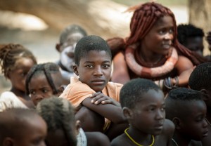 Eye contact Eye contact from one of a group of Ovahimba school children. Near Opupa Falls, North-Western Namibia.