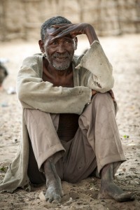 Sandman This man always stayed outside the main group in his village in the Okavango Region, Namibia-Boswana border, watching everything that was going on.