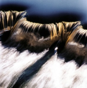 Smooth Water Smooth waterfall created by a man made weir in Leicestershire, UK