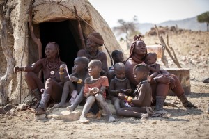 Ovahimba Family Ovahimba family outside their hut in a village near Opupa Falls. The Ovahimba people are nomadic and villages come and go with their migration.