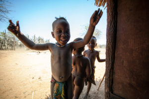 Kids in Doorway Ovahimba kids at the doorway of a hut, Namibia